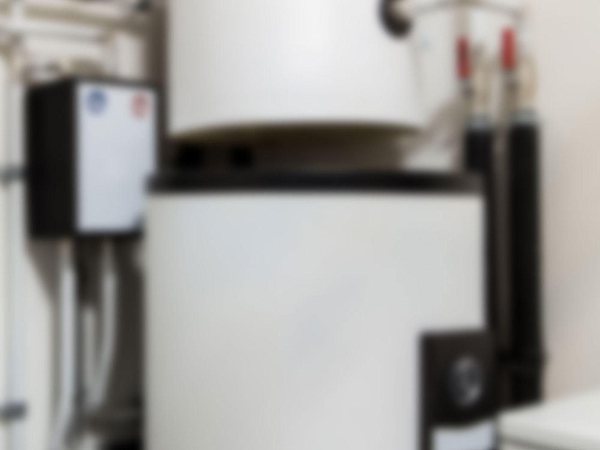 Blockheiz­kraftwerk bei Muster Elektro in Musterstadt